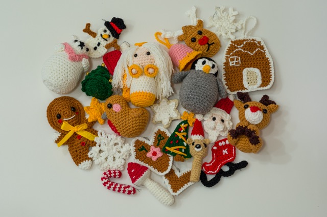 Photo of all the decorations made from the advent calendar scattered on a white surface.